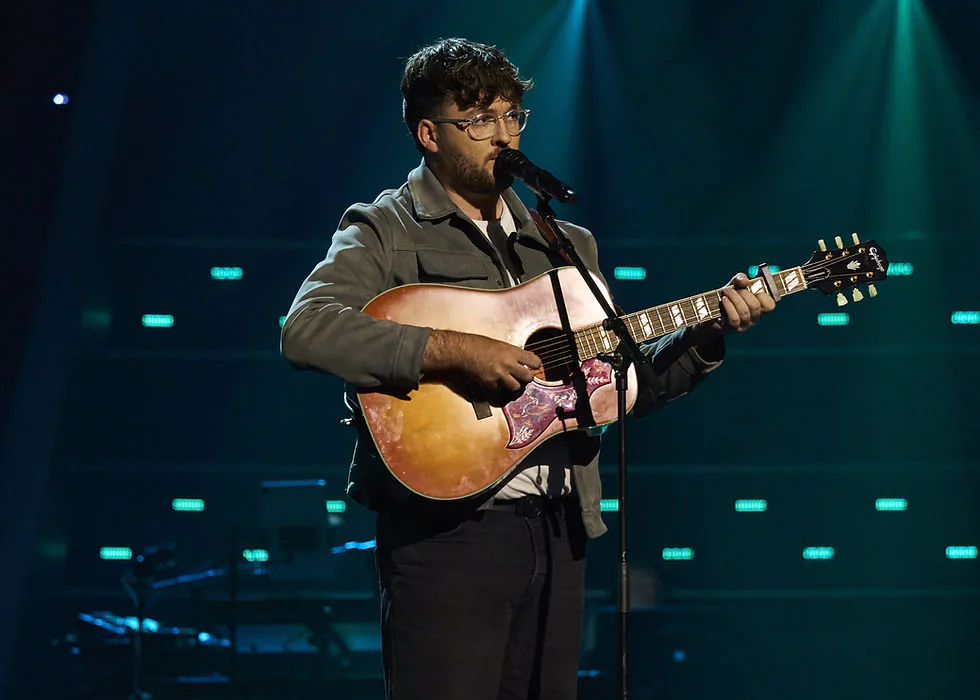 Ross McGuire performing on The Voice UK
